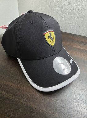 Puma Black Hat with Yellow Ferrari Shield and White Trim
